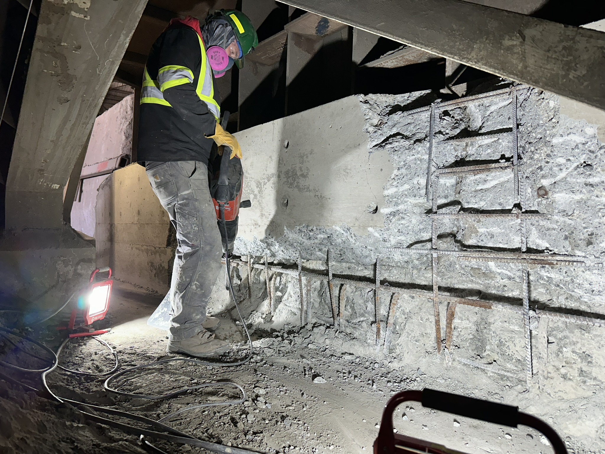 Concrete Repair Services Jacksonville, FL | Con Cure USA IMG 5956 a man working on a concrete wall